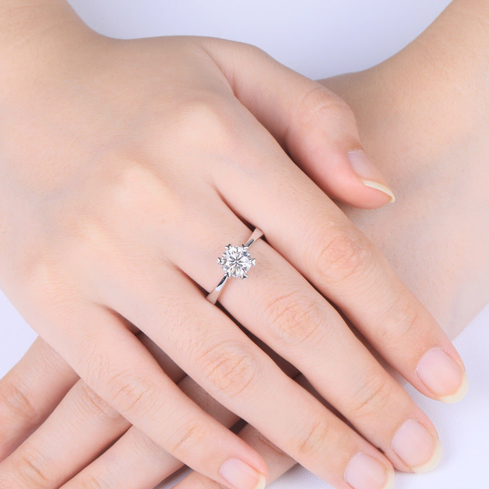 Damen Ring mit funkelndem Hauptstein und romantischem Herzdesign Shop Nory