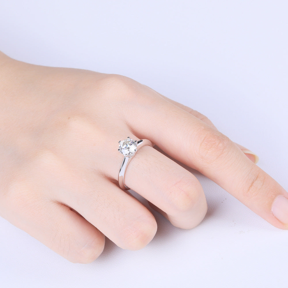 Damen eleganter Solitaire-Ring mit hochwertigem Zirkonbesatz Shop Nory