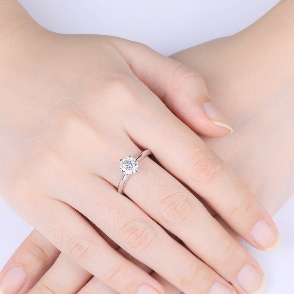 Damen eleganter Solitaire-Ring mit hochwertigem Zirkonbesatz Shop Nory