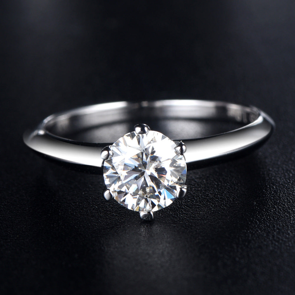 Damen eleganter Solitaire-Ring mit hochwertigem Zirkonbesatz Shop Nory