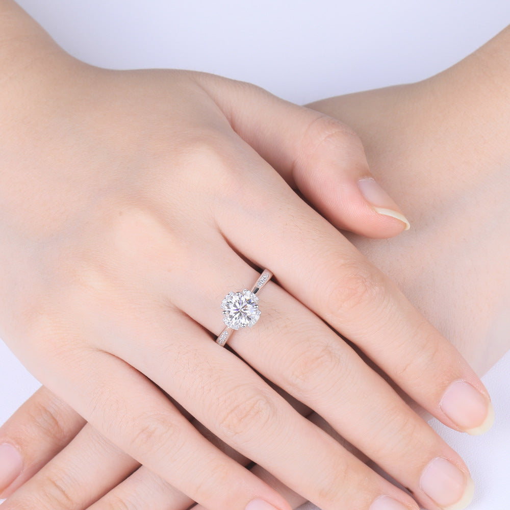 Damen Ring mit funkelndem Solitär und kunstvollem Zirkonia-Besatz Shop Nory
