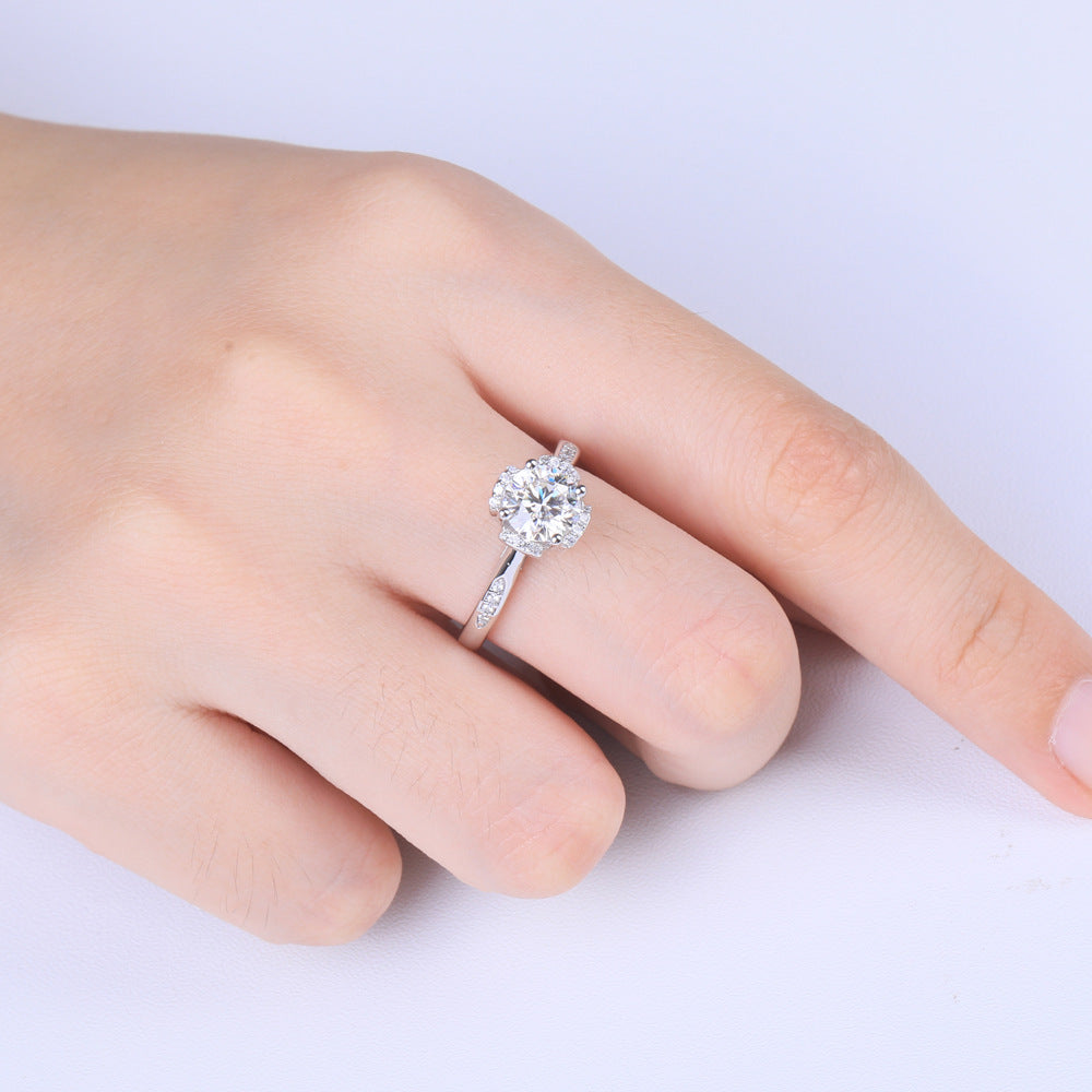 Damen Ring mit funkelndem Solitär und kunstvollem Zirkonia-Besatz Shop Nory