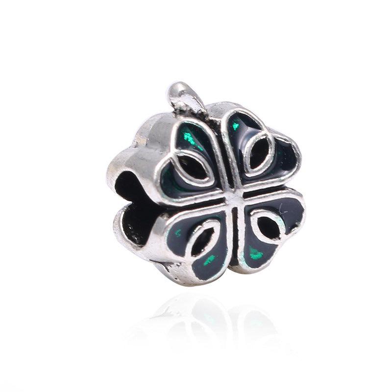 Herz-Charms mit Vogel-Motiv und Emaillierten Blättern