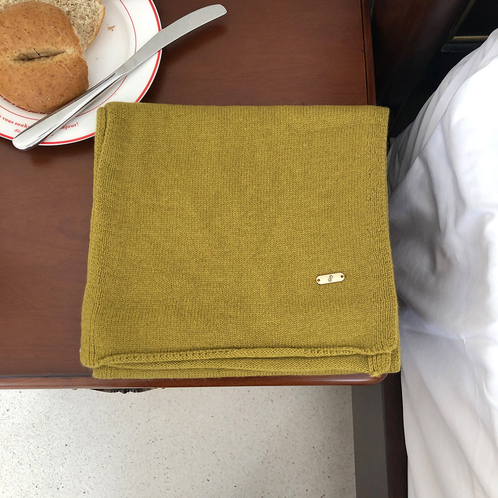 Wärmender Schal aus Merinowolle