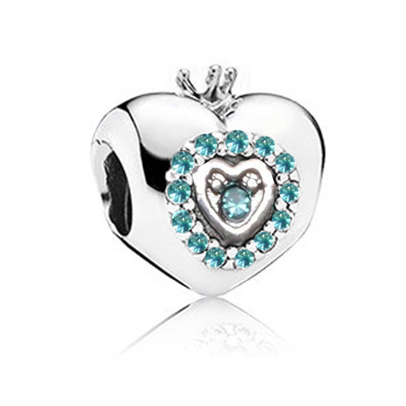 Herz-Charms mit Vogel-Motiv und Emaillierten Blättern