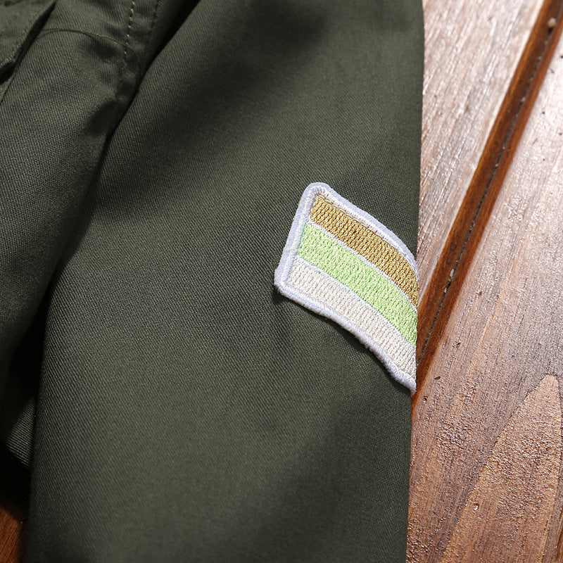 Herren Utility-Hemdjacke mit Schulterpatten, aufgesetzten Brustpattentaschen und Patch‑Applikationen Shop Nory