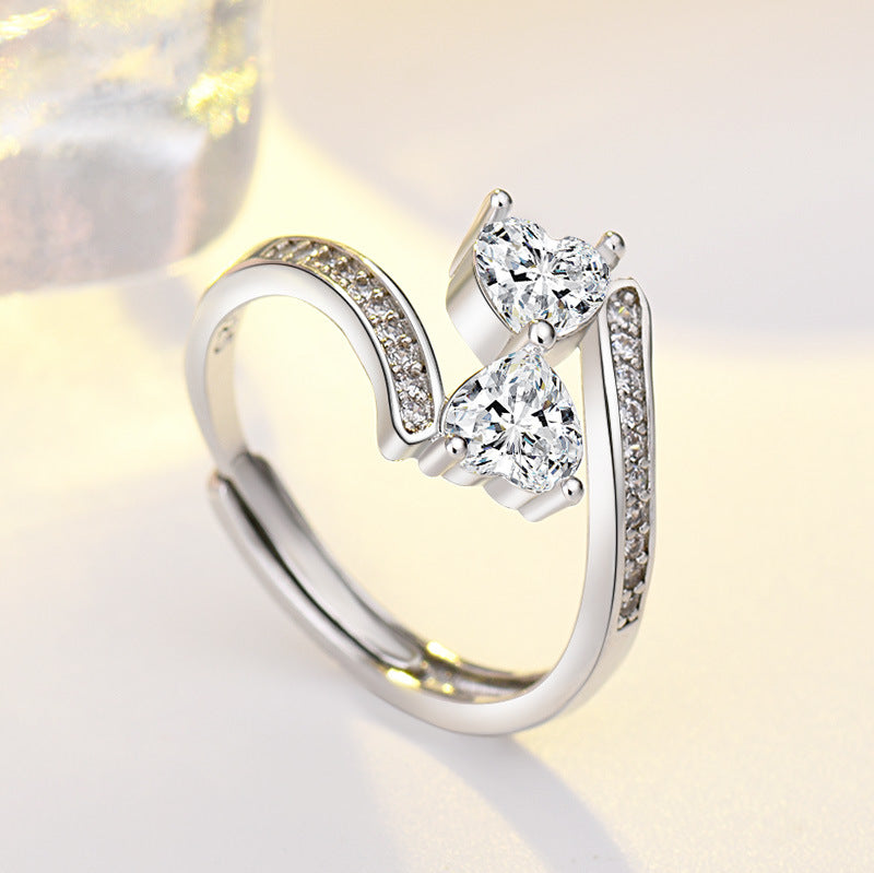 Damen verstellbarer Ring mit funkelnden Herz-Zirkonia und elegantem Design Shop Nory