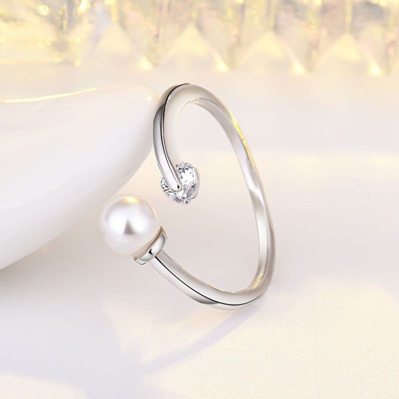 Damen Offener Ring mit elegantem Perlen- und Herz-Zirkonia-Design Shop Nory