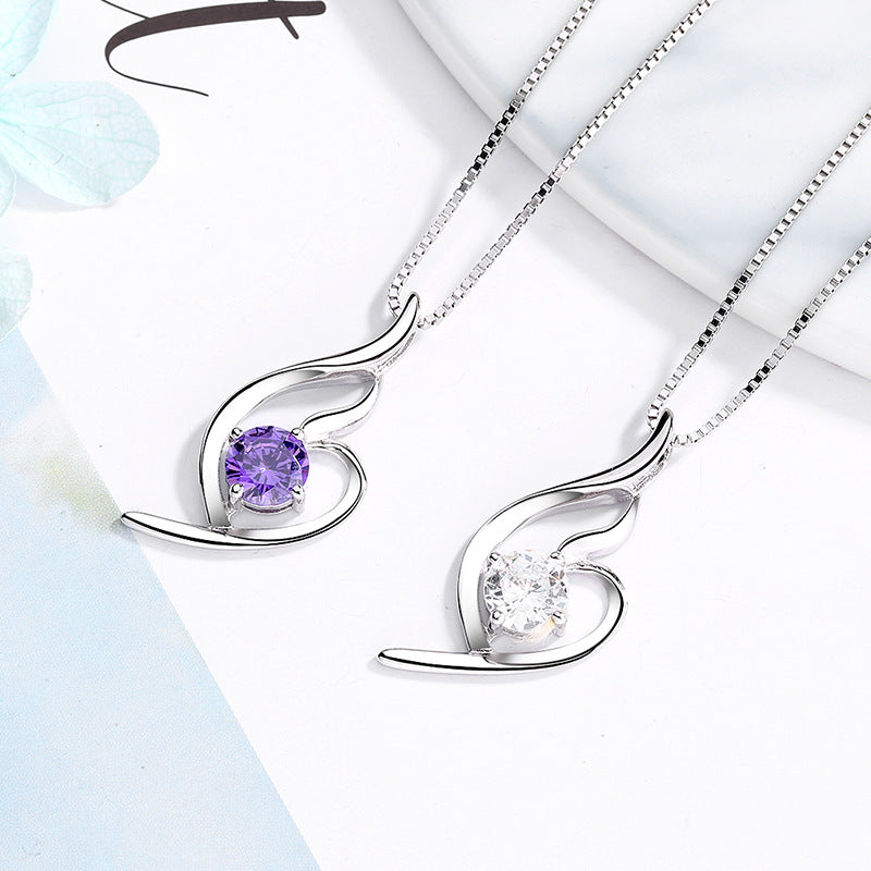 Damen Halskette mit elegantem Spiralmotiv und funkelndem lila Stein Shop Nory