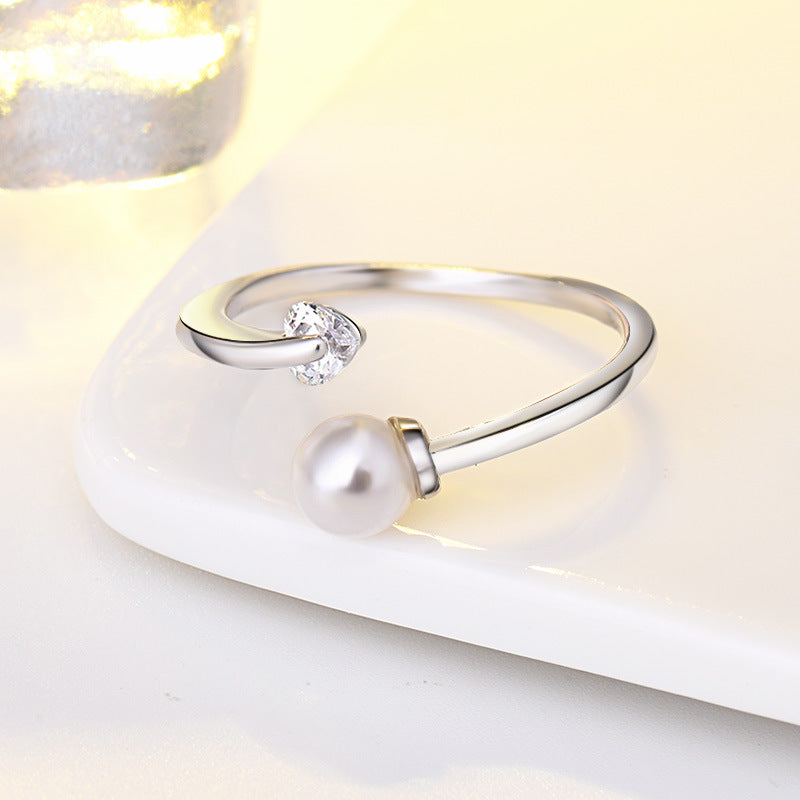 Damen Offener Ring mit elegantem Perlen- und Herz-Zirkonia-Design Shop Nory