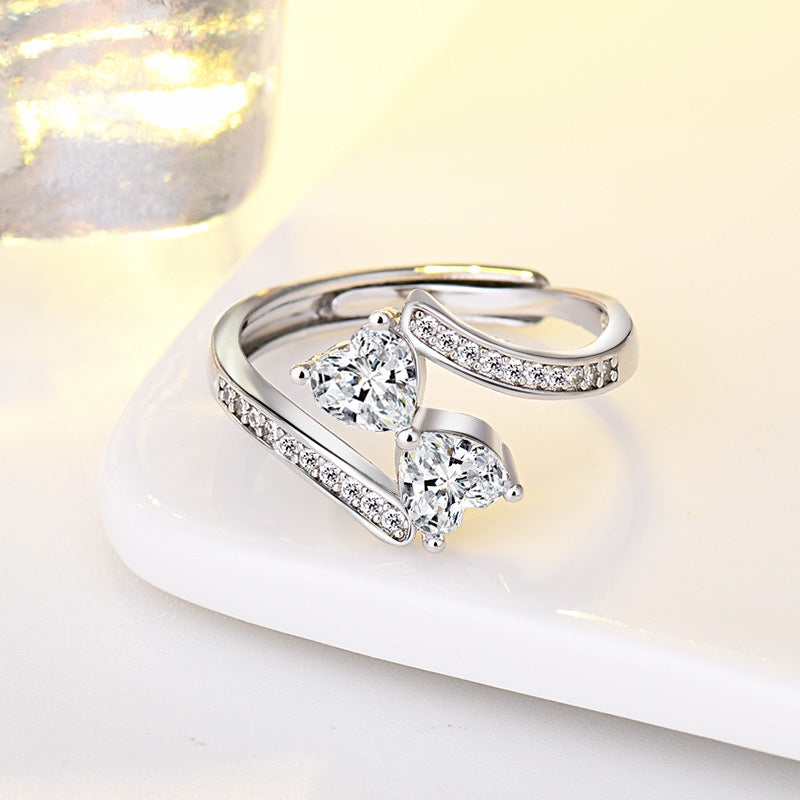 Damen verstellbarer Ring mit funkelnden Herz-Zirkonia und elegantem Design Shop Nory