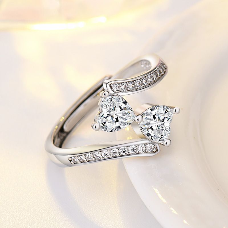 Damen verstellbarer Ring mit funkelnden Herz-Zirkonia und elegantem Design Shop Nory