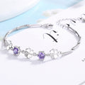 Damen Armband mit floralem Design und funkelnden Zirkonia von Shop Nory