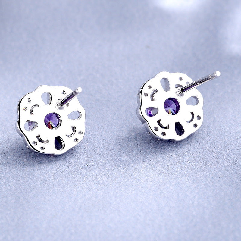 Damen Ohrstecker mit floralen Details und funkelnden Kristallen Shop Nory
