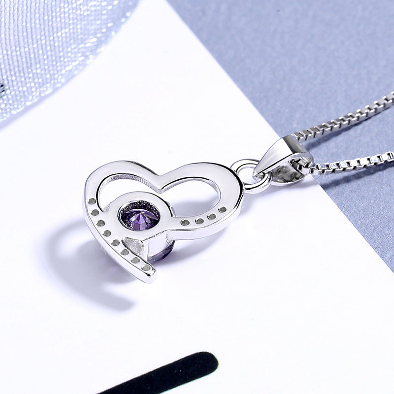 Damen Halskette mit einzigartigem herzförmigem Anhänger und leuchtendem Edelstein Shop Nory