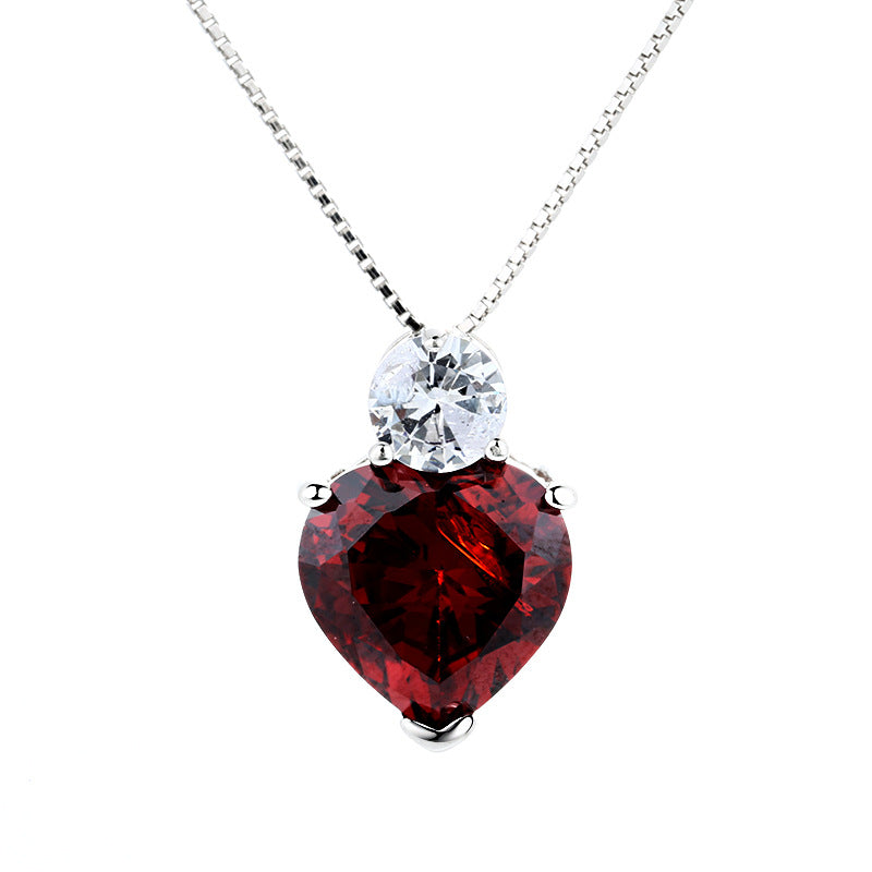 Damen Halskette mit herzförmigem Rubinanhänger und funkelndem Zirkonia Shop Nory
