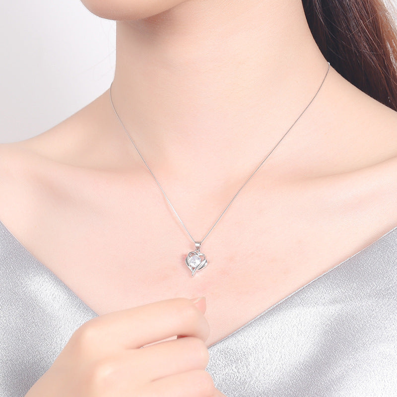 Damen Halskette mit elegantem Herzanhänger und funkelndem Zirkon Shop Nory