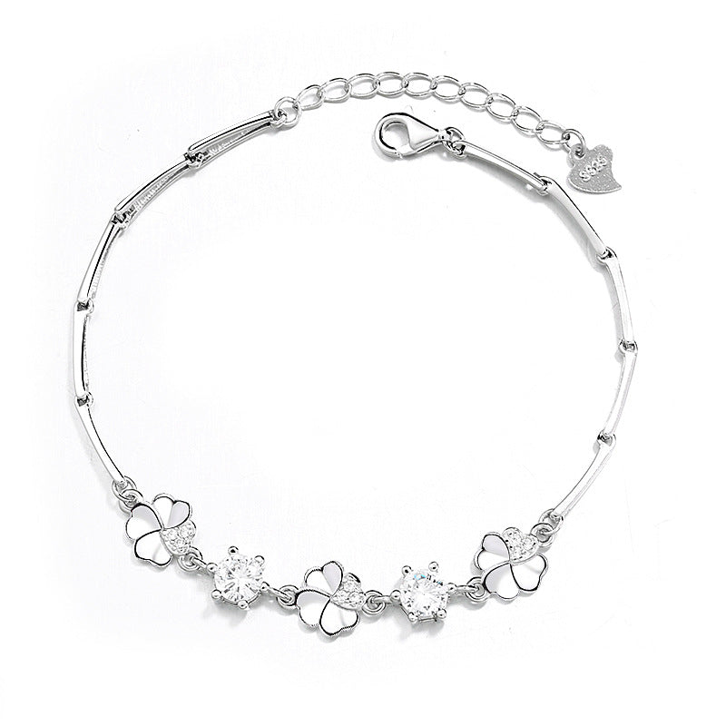 Damen Armband mit floralem Design und funkelnden Zirkonia von Shop Nory