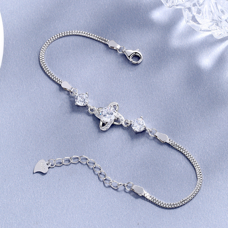 Damen Armband mit funkelnden Zirkonia und eleganter Gliederstruktur Shop Nory