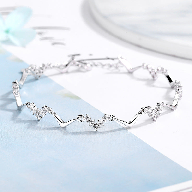 Damen Armband mit kreativem Wellen- und Zirkonmotiv Shop Nory