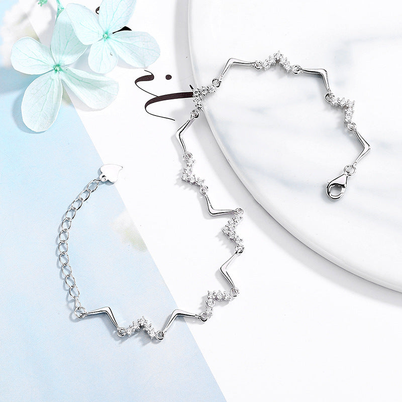 Damen Armband mit kreativem Wellen- und Zirkonmotiv Shop Nory