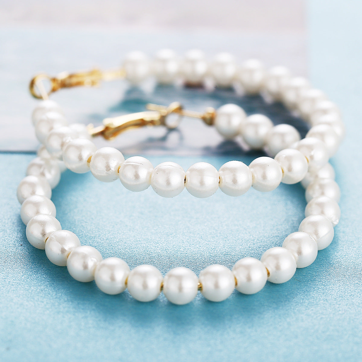 Damen Perlenohrringe mit goldenen Akzenten Shop Nory