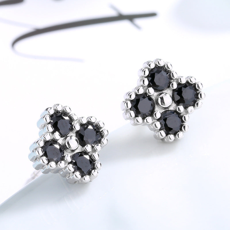 Damen Ohrringe mit mehrlagigem Blumendesign und funkelnden Zirkonia Shop Nory