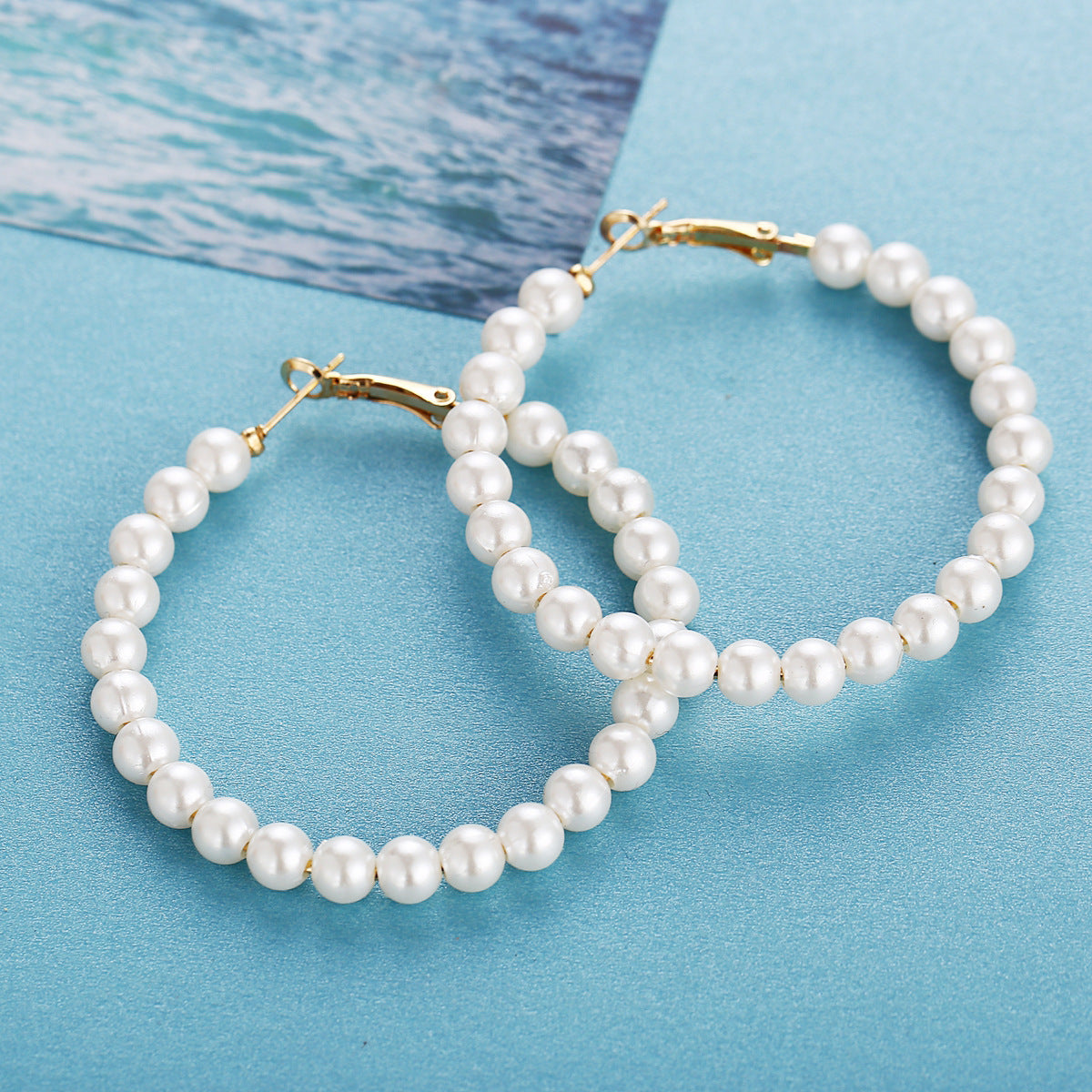 Damen Perlenohrringe mit goldenen Akzenten Shop Nory