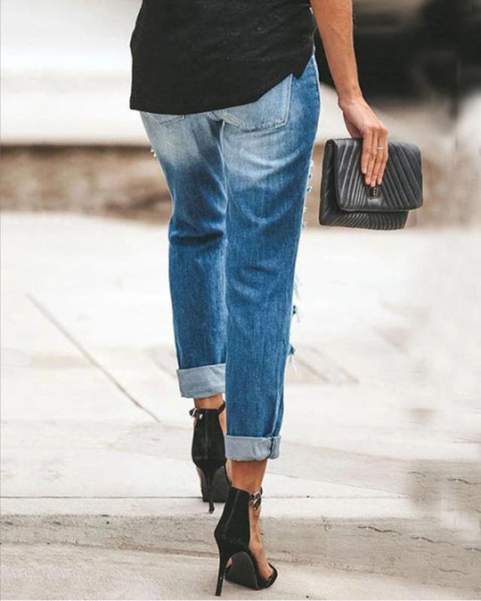 Damen Ripped Jeans im modernen Slim-Fit Schnitt mit fransigen Details