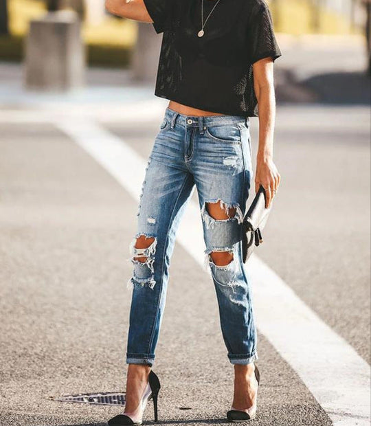 Damen Ripped Jeans im modernen Slim-Fit Schnitt mit fransigen Details