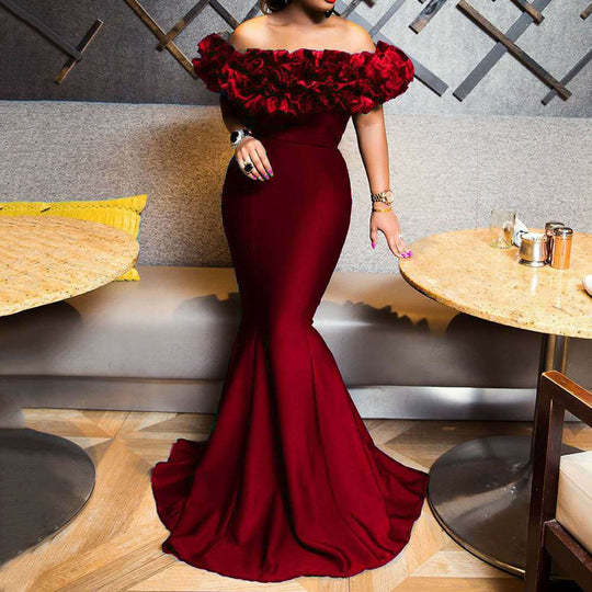 Damen Abendkleid mit voluminösem Rüschensaum