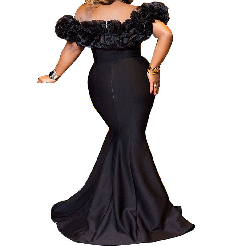 Damen Abendkleid mit voluminösem Rüschensaum