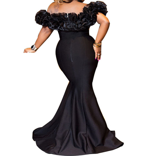 Damen Abendkleid mit voluminösem Rüschensaum