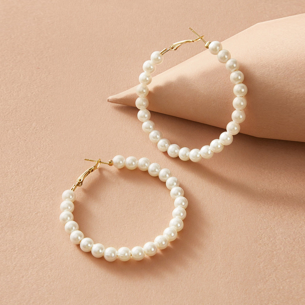 Damen Perlenohrringe mit goldenen Akzenten Shop Nory