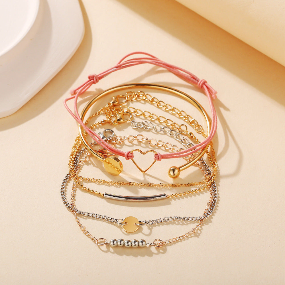 Damen Armband-Set mit filigranen Designs und liebevollen Anhängern Shop Nory