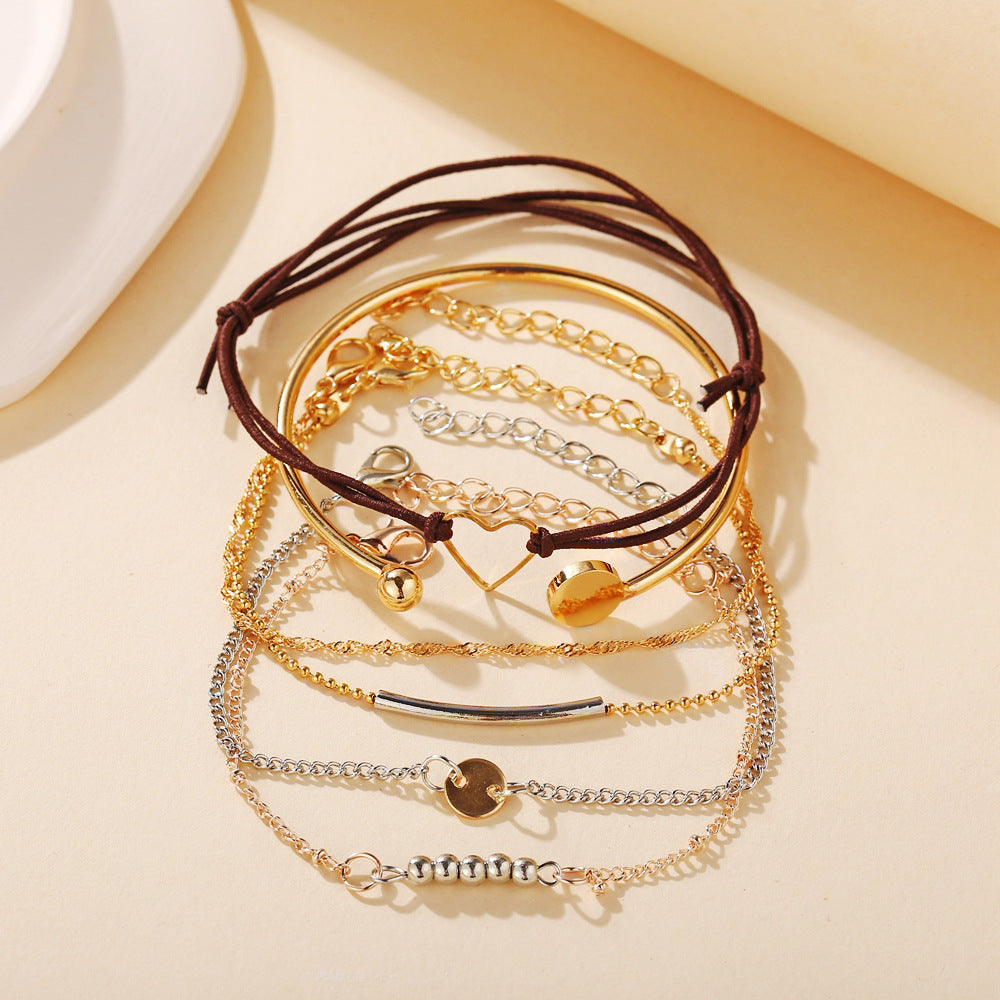 Damen Armband-Set mit filigranen Designs und liebevollen Anhängern Shop Nory