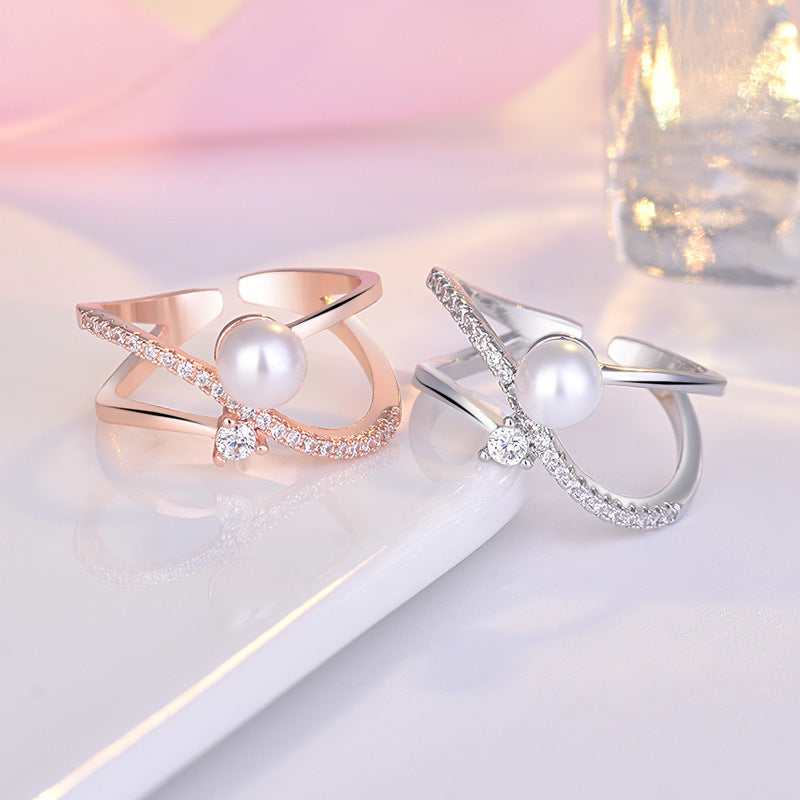 Damenring mit elegantem Perl-Design und funkelnden Zirkonia-Elementen Shop Nory