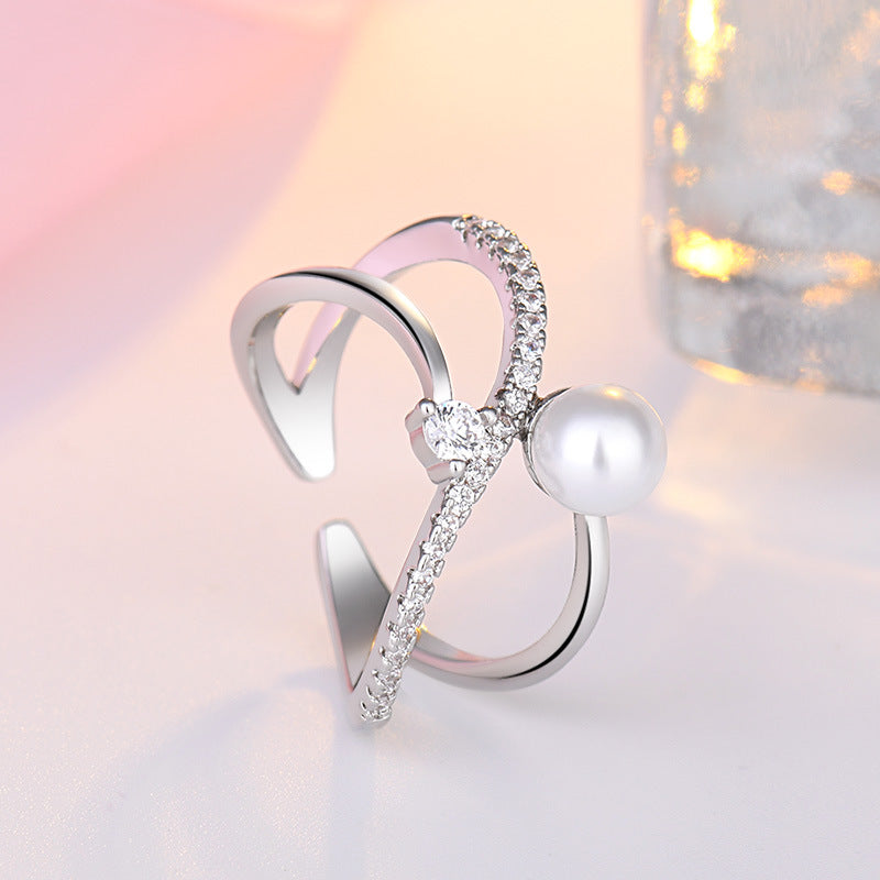Damenring mit elegantem Perl-Design und funkelnden Zirkonia-Elementen Shop Nory