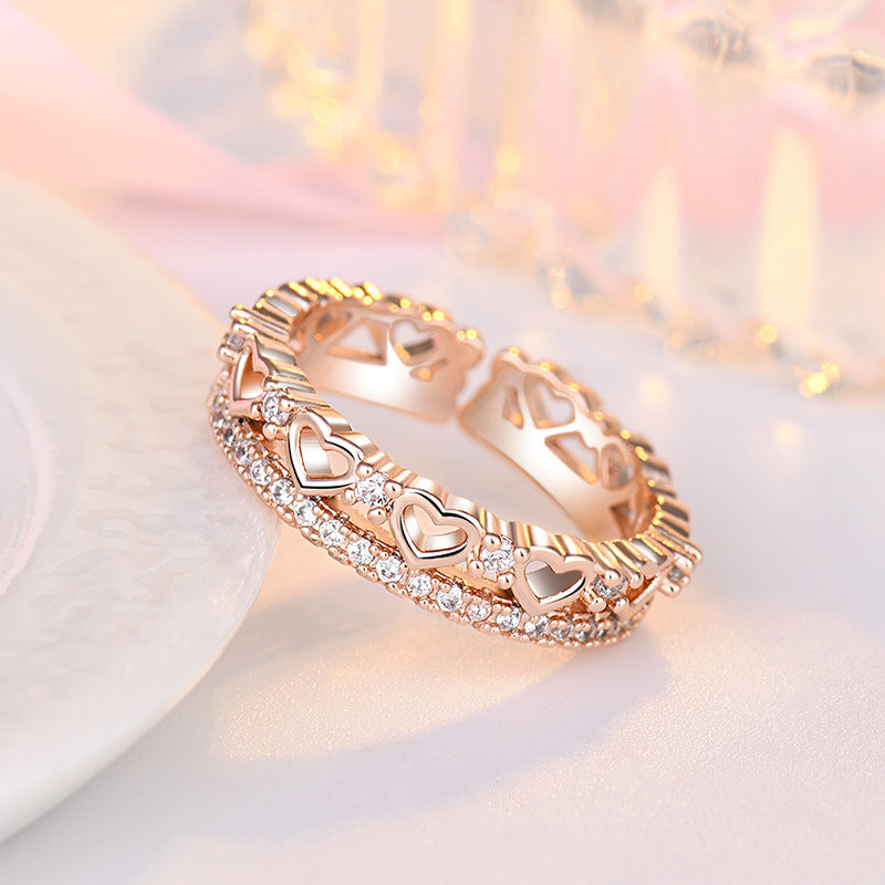 Damenring mit kunstvollem Herzdesign und funkelndem Zirkonia-Besatz Shop Nory
