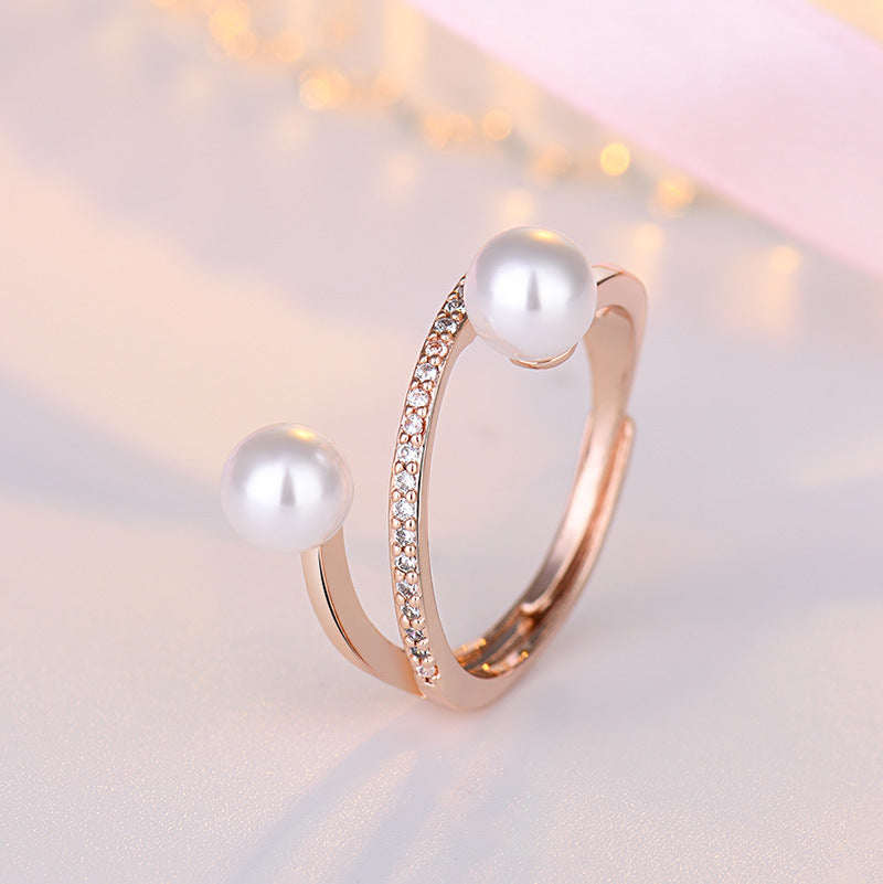Damen offener Ring mit elegantem Perlenbesatz und funkelnden Zirkonia Shop Nory