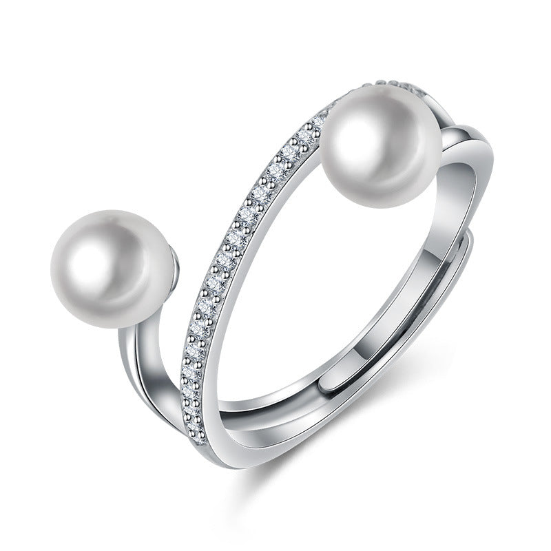 Damen offener Ring mit elegantem Perlenbesatz und funkelnden Zirkonia Shop Nory