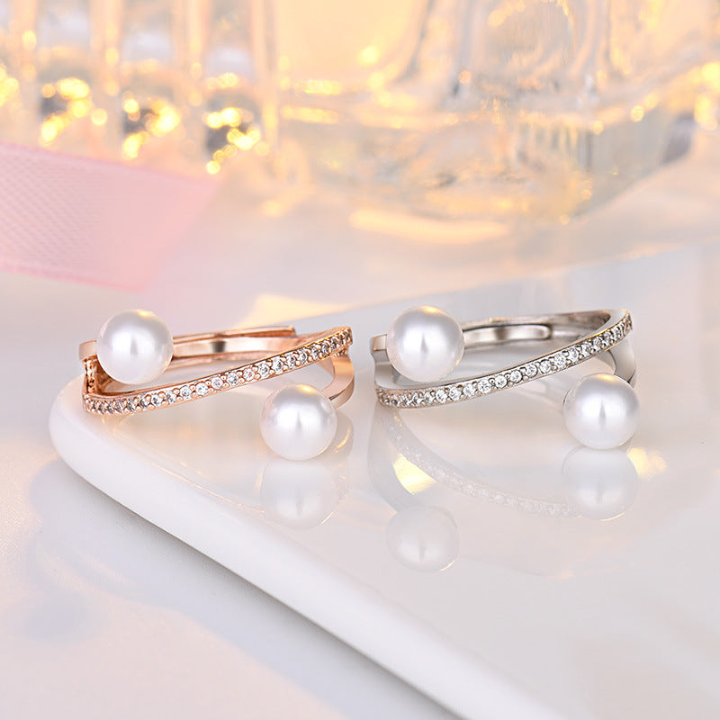 Damen offener Ring mit elegantem Perlenbesatz und funkelnden Zirkonia Shop Nory