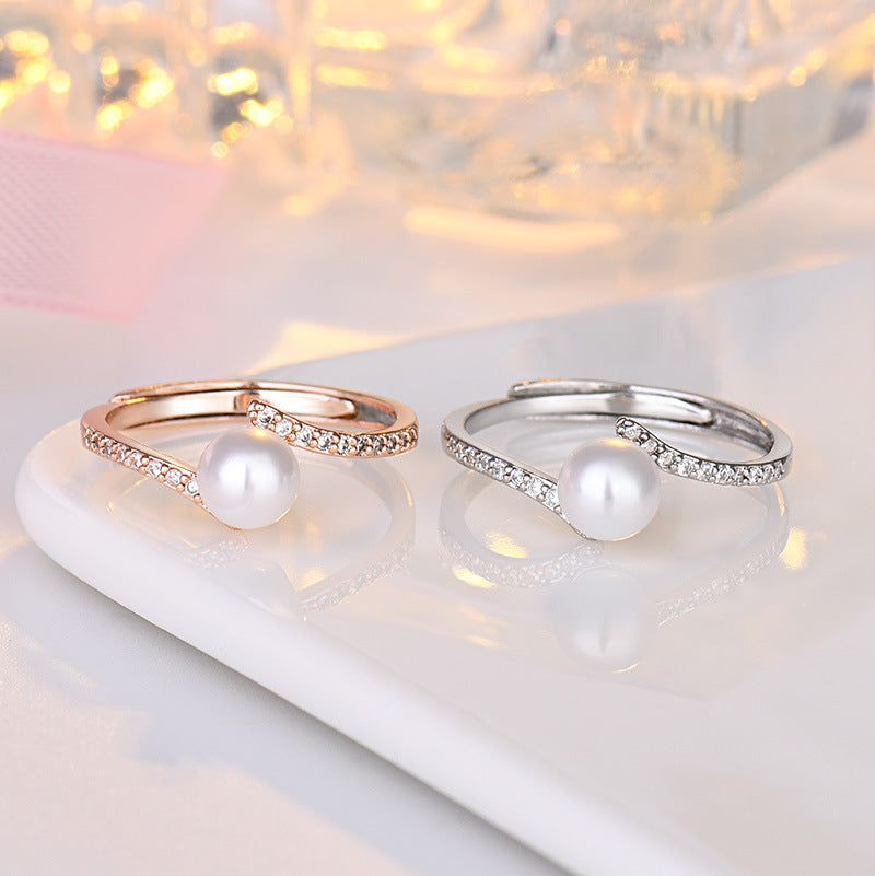 Damenring mit eleganter Perle und funkelndem Zirkonia-Besatz Shop Nory