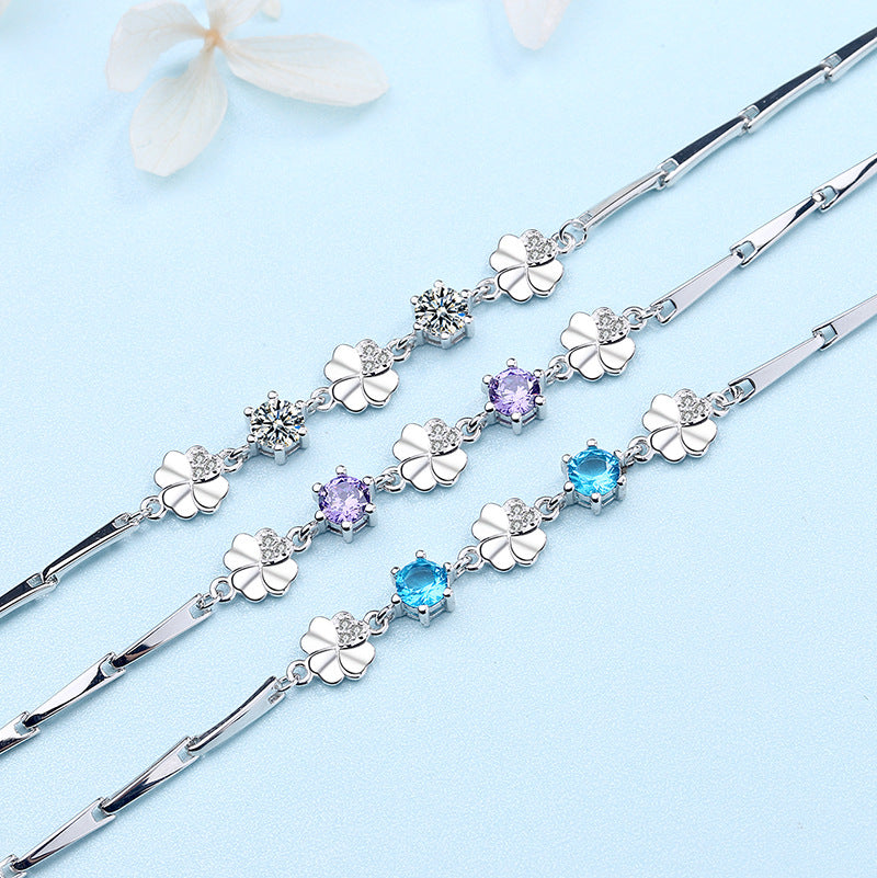 Damen Armband mit filigranem Blumen-Design und glitzernden Details Shop Nory