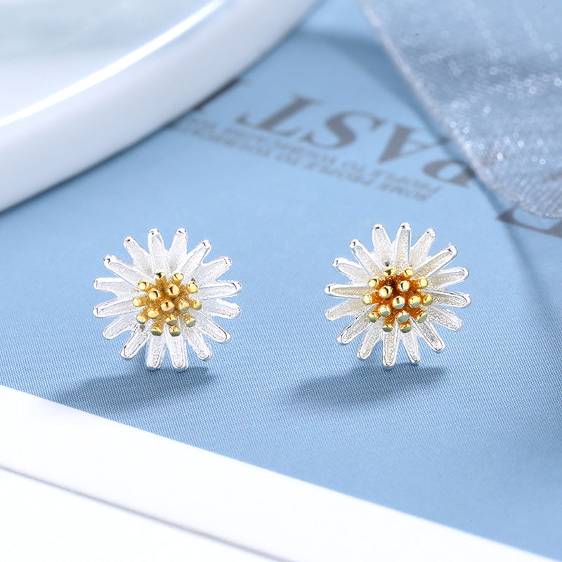 Damen Ring mit filigranem Blumenmotiv und goldenen Akzenten Shop Nory