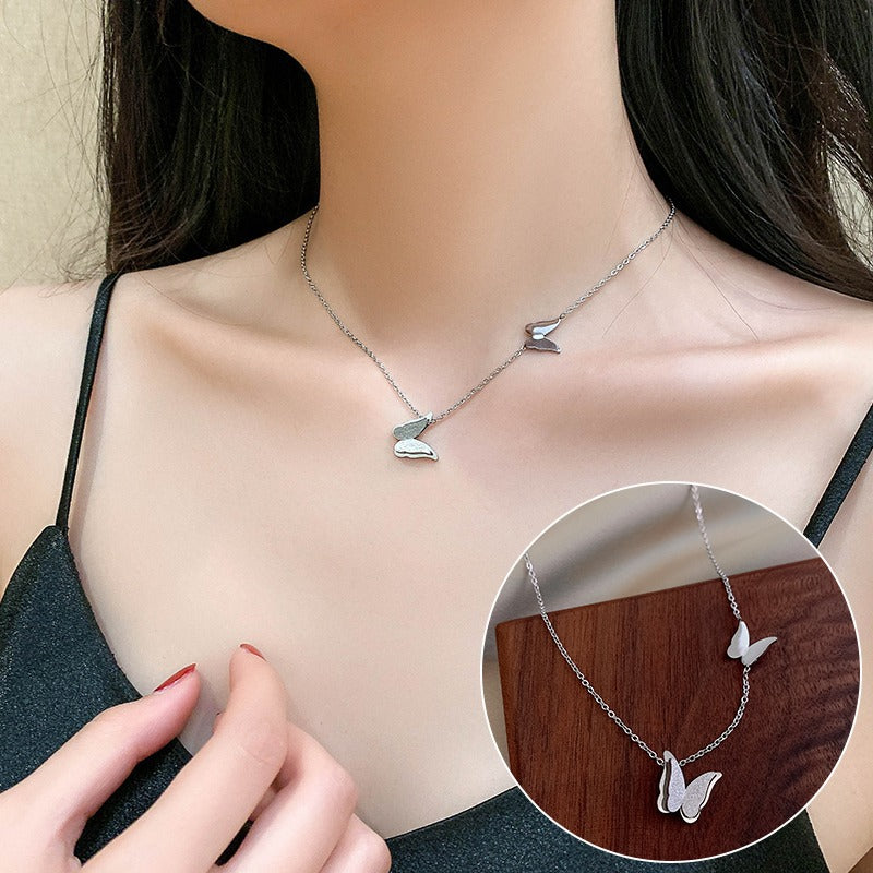Damen Halskette mit filigranen Schmetterlingsanhängern Shop Nory