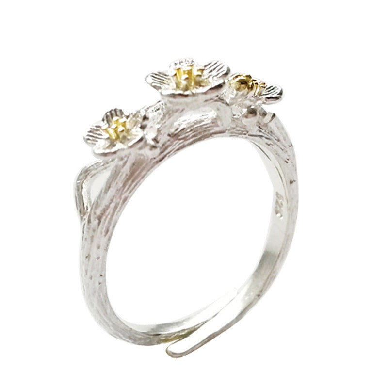 Damen filigraner Ring mit floralem Design und Goldakzenten Shop Nory