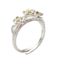 Damen filigraner Ring mit floralem Design und Goldakzenten Shop Nory