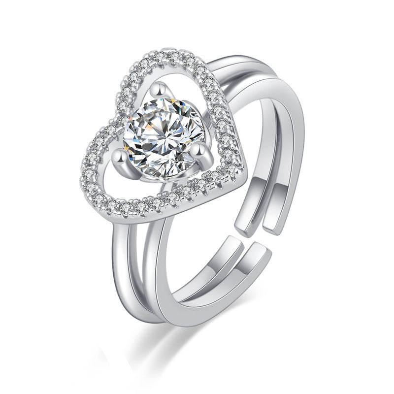 Damen Offener Ring mit kunstvollem geschwungenem Design und roségoldenen Akzenten Shop Nory