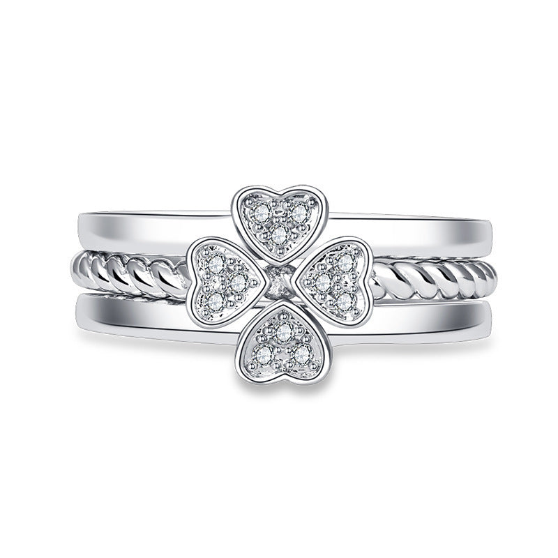 Damen Offener Ring mit kunstvollem geschwungenem Design und roségoldenen Akzenten Shop Nory